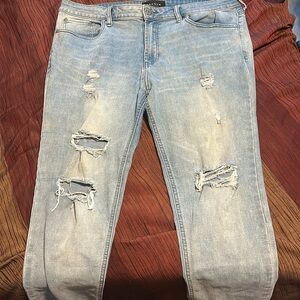 Light blue distressed jeans